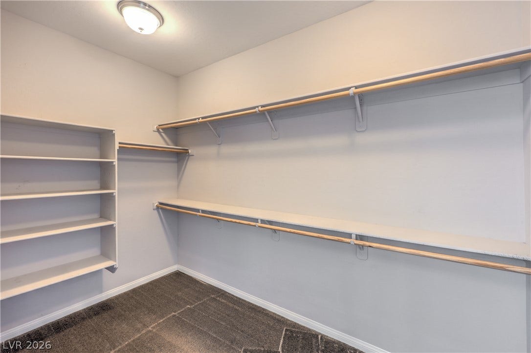 413 Via Gigante, Henderson, NV 89011 Ample shelving and hanging space in this well-appointed closet, ready for personalized organization.