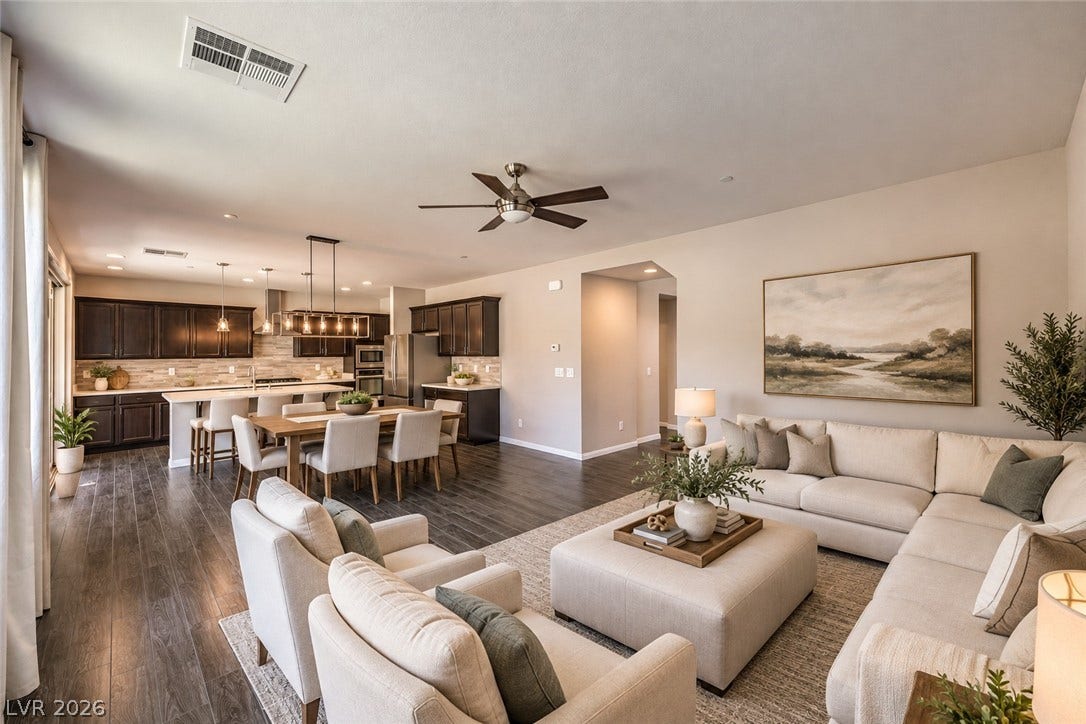 413 Via Gigante, Henderson, NV 89011 Virtually Staged: An open floorplan seamlessly connects the airy living space to the adjacent kitchen.