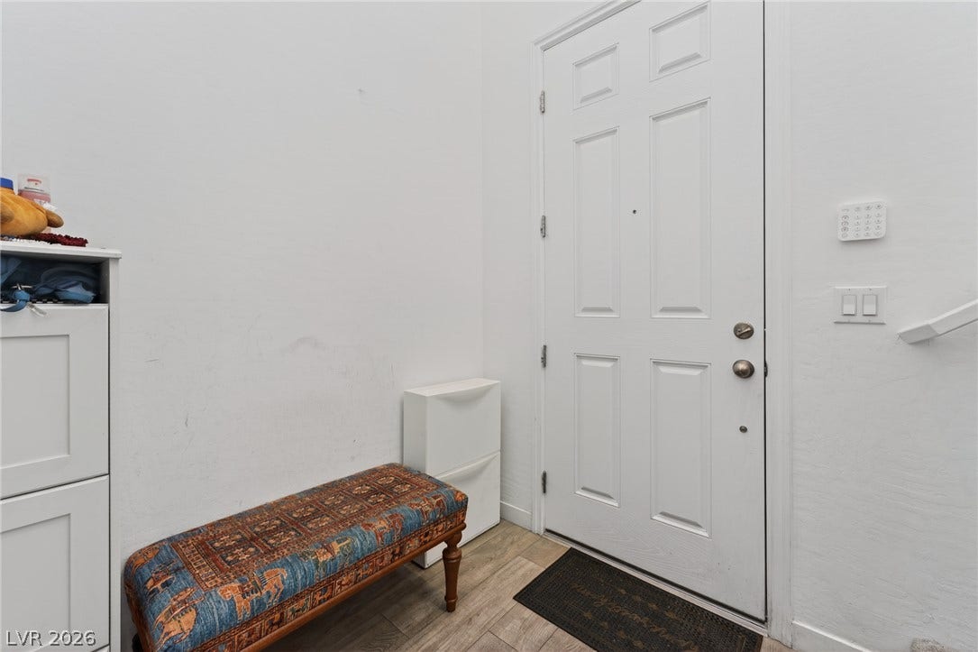 3700 Canis Minor Lane, #19206, Henderson, NV 89052 An inviting entryway welcomes guests with clean lines and durable wood-look flooring.