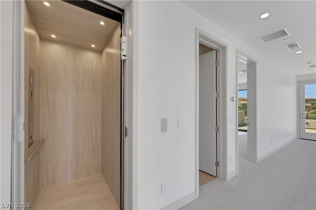 66 Lakefront Drive, Henderson, NV 89011 Navigate this sophisticated residence with ease using the sleek, in-home elevator.