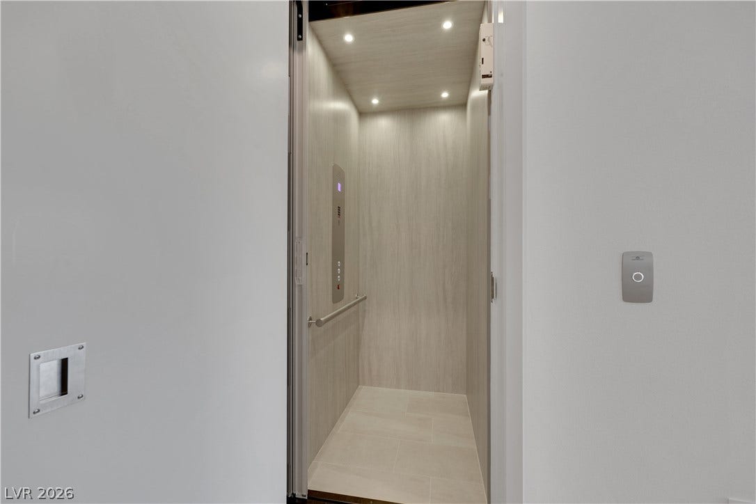 66 Lakefront Drive, Henderson, NV 89011 Navigate between levels with ease in this well-appointed private elevator.