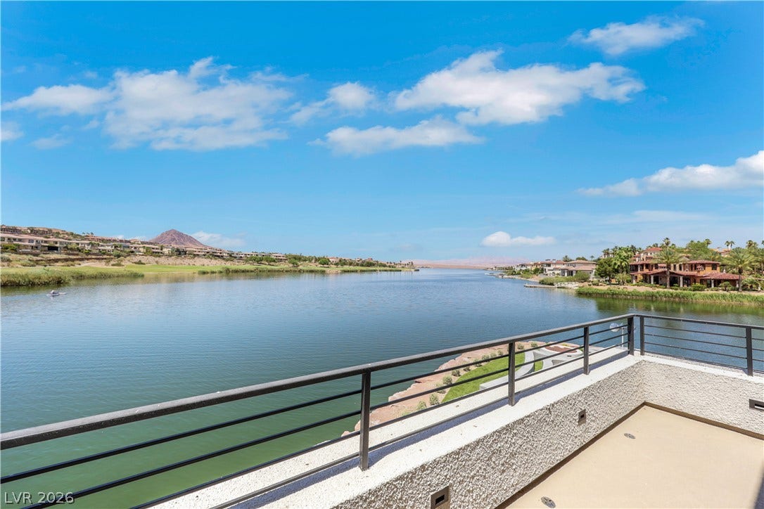 66 Lakefront Drive, Henderson, NV 89011 Uninterrupted waterfront vistas from this spacious outdoor balcony, perfect for serene mornings or evening gatherings.