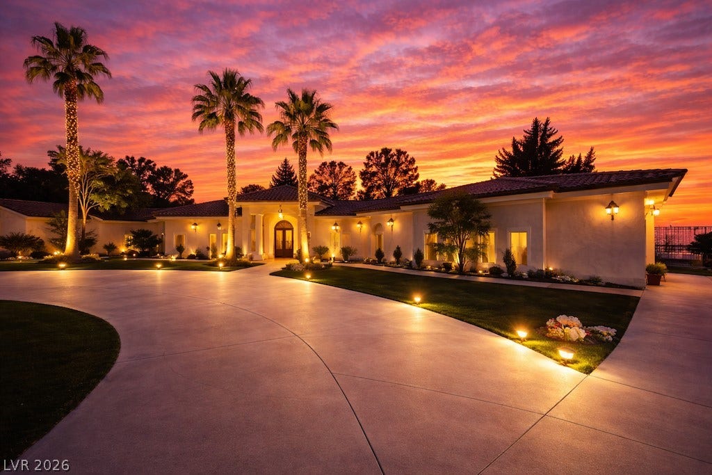 Mediterranean / spanish-style home with stucco siding and curved driveway