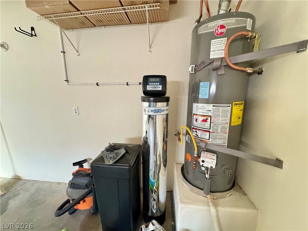 Essential home utility systems are neatly arranged alongside integrated wire shelving for convenient storage.