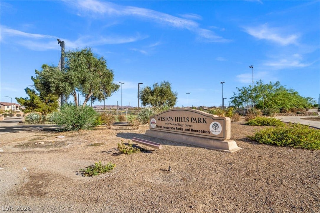 Nearby park facilities offer convenient outdoor recreation under clear desert skies.