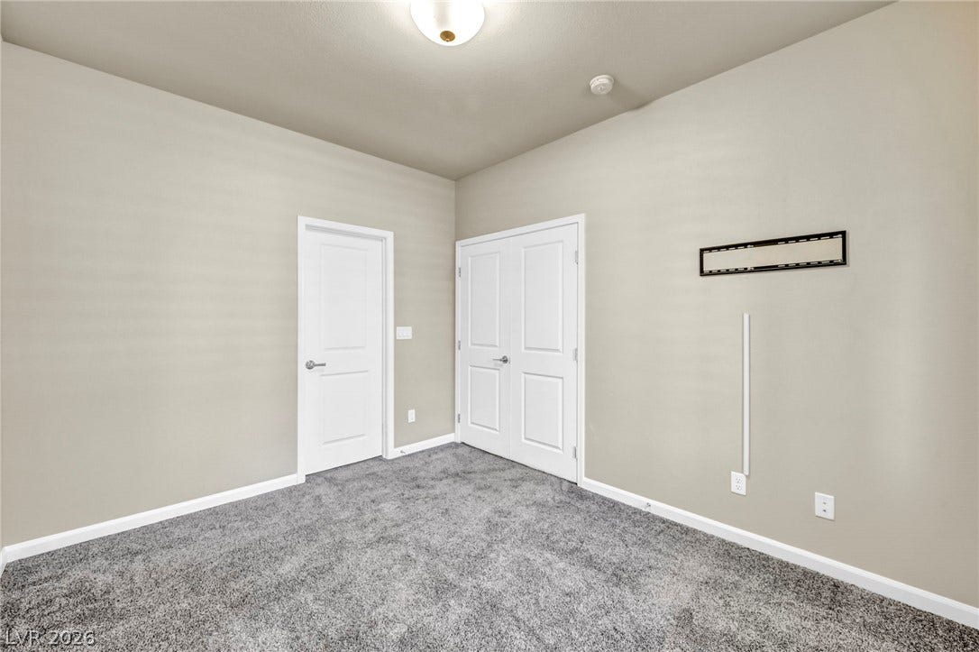 6571 Tangled Vines Avenue, Las Vegas, NV 89139 Soft carpeting underfoot defines this versatile space ready for customization.