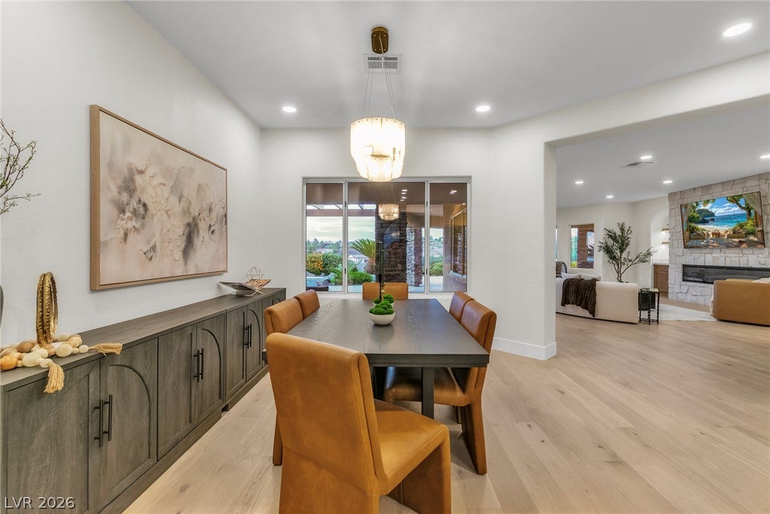 2734 Cherrydale Falls Drive, Henderson, NV 89052 An open floor plan seamlessly connects the dining space to the adjacent living area.