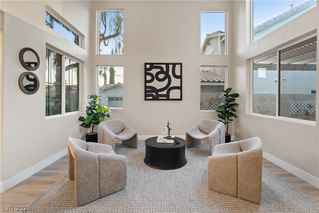 1662 Ravanusa Drive, Henderson, NV 89052 Towering ceilings and multiple tiers of windows create a light-filled architectural statement.