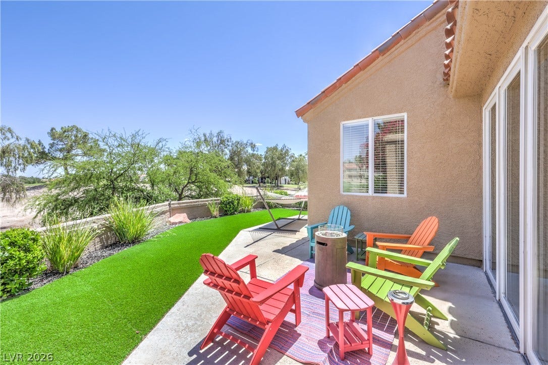 8211 Round Hills Circle, Las Vegas, NV 89113 Enjoy outdoor living on this inviting patio with a view of the desert landscape.