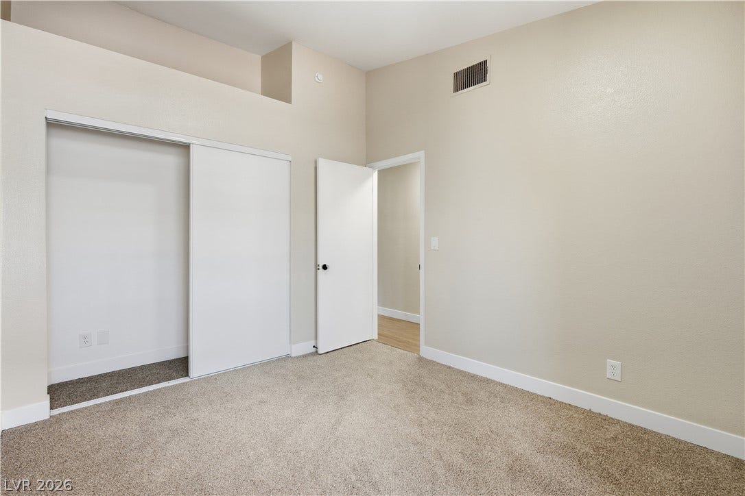 1013 Greystone Drive, Las Vegas, NV 89108 High ceilings and neutral carpet define this versatile space.