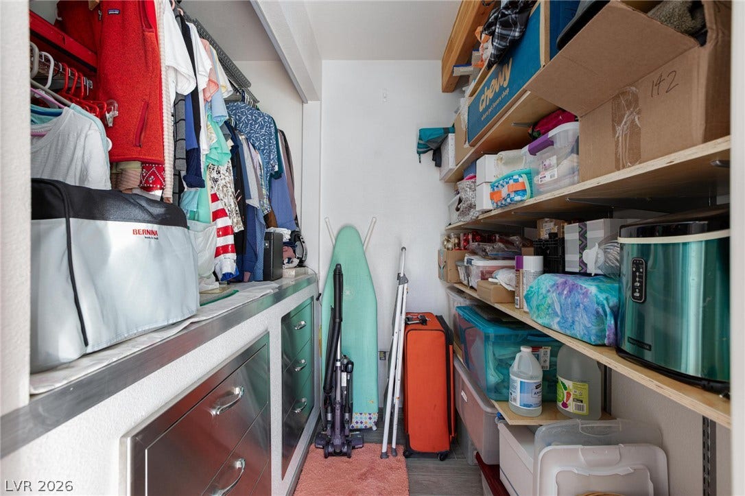 8175 Arville Street, #142, Las Vegas, NV 89139 Ample built-in storage options and shelving maximize efficiency in this functional walk-in closet space.