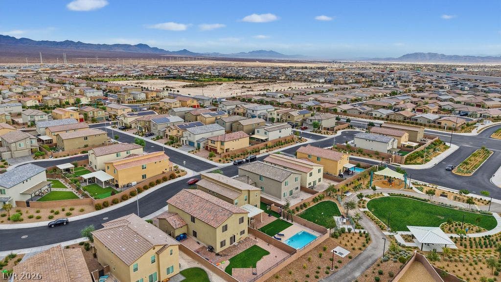 Sweeping mountain and desert views frame a beautifully planned suburban neighborhood and park.