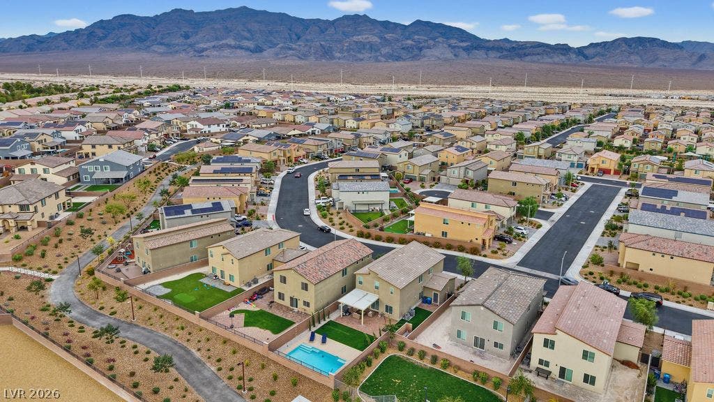 Majestic mountain ridges frame this expansive neighborhood of modern multi-level homes.