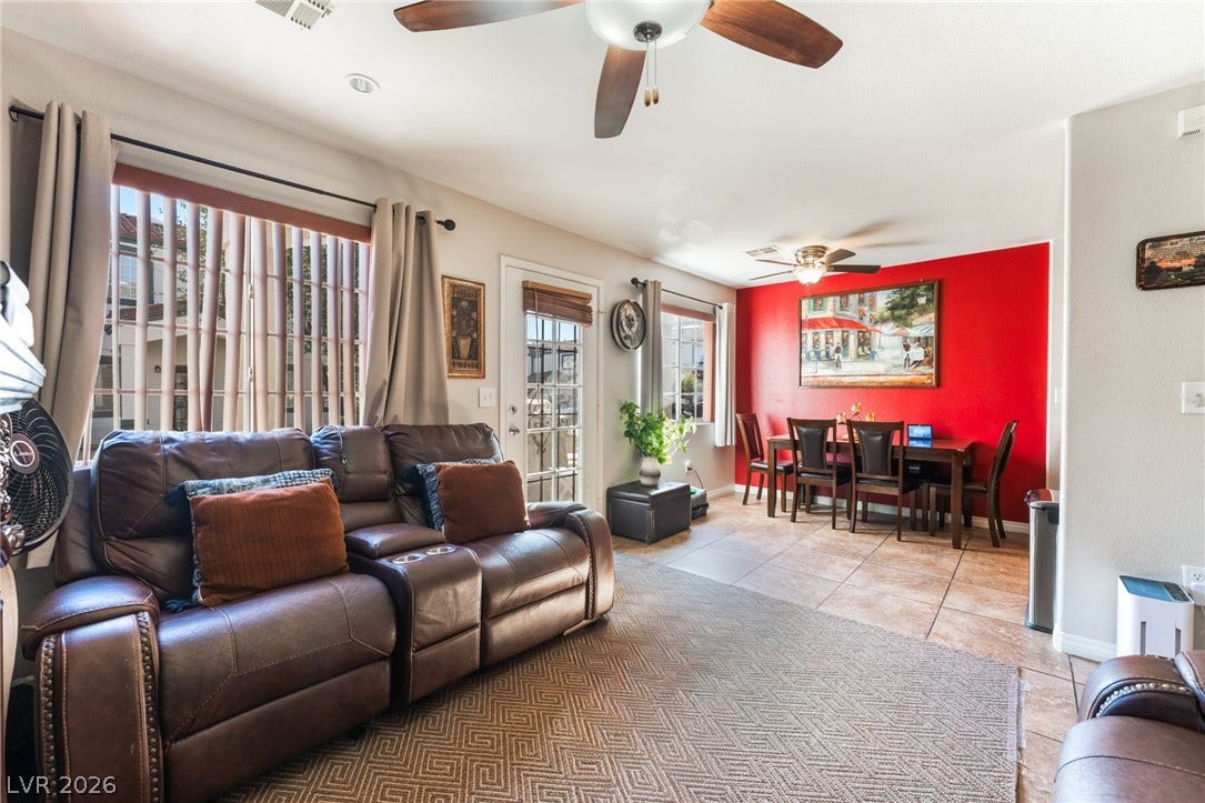 5330 E Charleston Boulevard, #123, Las Vegas, NV 89142 An open layout connects the comfortable living space directly to the adjacent dining area.