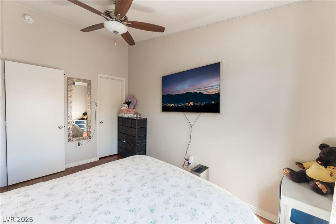 5330 E Charleston Boulevard, #123, Las Vegas, NV 89142 Gleaming hardwood floors and a lofty ceiling define this inviting second bedroom.