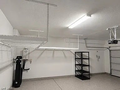 2126 Albury Avenue, North Las Vegas, NV 89086 An organized garage space features durable textured flooring and abundant overhead storage racks.