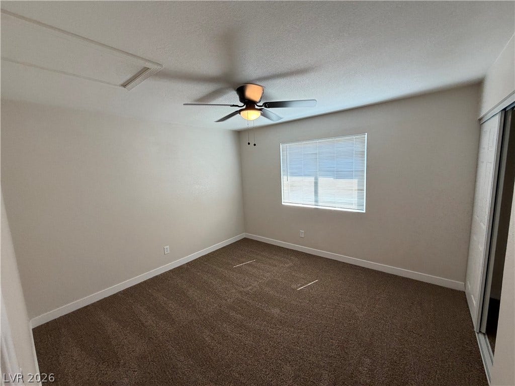 500 Grimsby Avenue, Henderson, NV 89014 Plush carpeting and a wide window create a comfortable, inviting atmosphere.