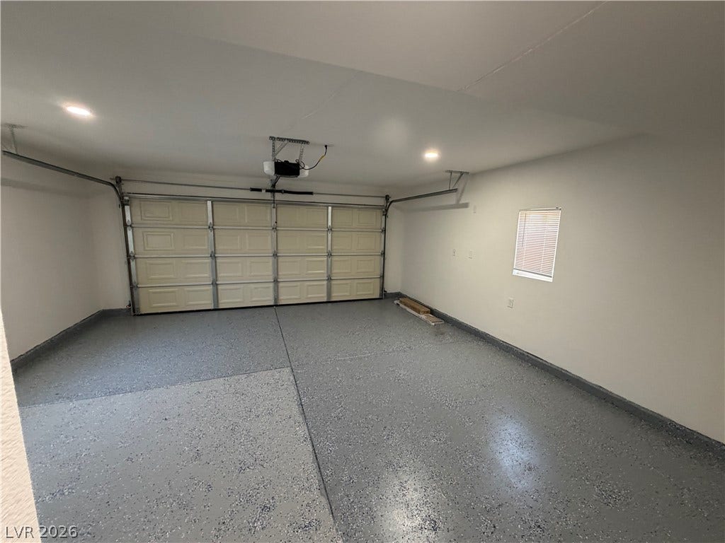 500 Grimsby Avenue, Henderson, NV 89014 A spacious garage showcases durable epoxy flooring and clean walls.