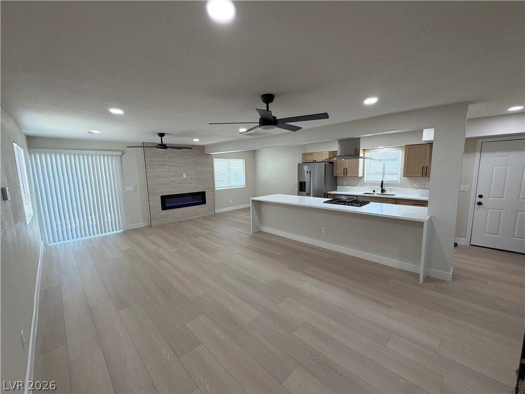 500 Grimsby Avenue, Henderson, NV 89014 An open floorplan seamlessly connects the airy living area and modern kitchen.