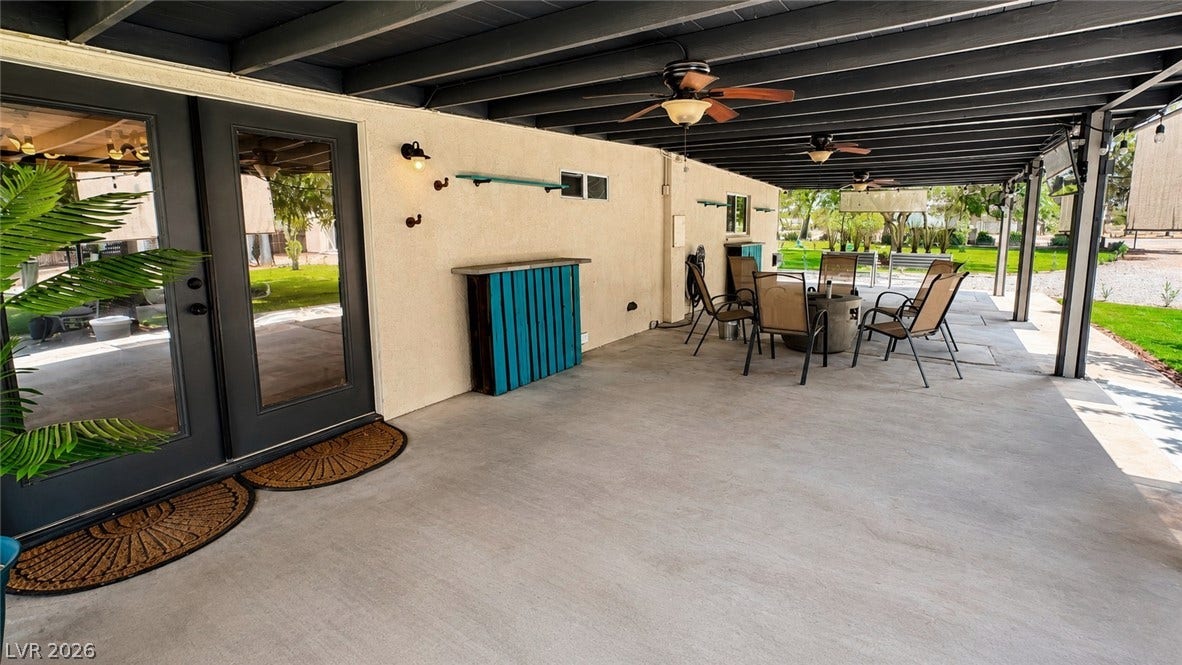 6130 Hawkins Way, Pahrump, NV 89061 A spacious covered patio provides a shaded outdoor space perfect for entertaining and relaxation.