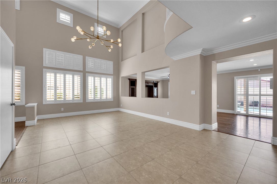 10149 Whitney Falls Court, Las Vegas, NV 89148 Towering ceilings and durable tile flooring define this architectural living space.