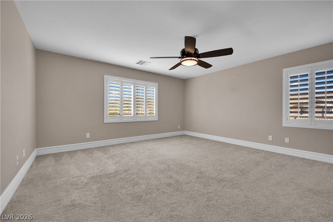 10149 Whitney Falls Court, Las Vegas, NV 89148 Plush carpeting underfoot and plantation shutters create a comfortable and inviting atmosphere.