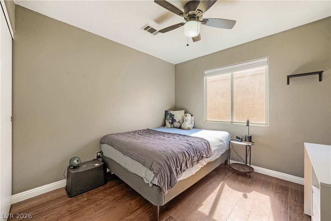 3536 Golden Pedal Street, Las Vegas, NV 89129 Rich wood-inspired floors and neutral walls create a welcoming, comfortable atmosphere.