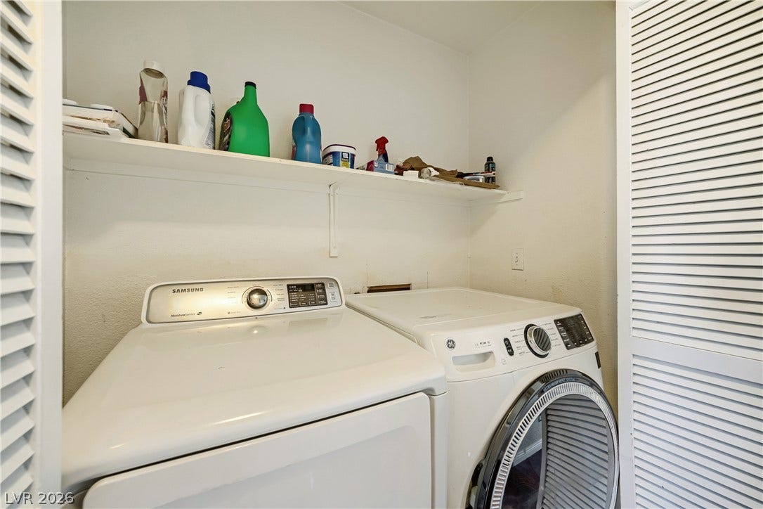 3536 Golden Pedal Street, Las Vegas, NV 89129 A dedicated laundry alcove features built-in shelving and louvered doors.