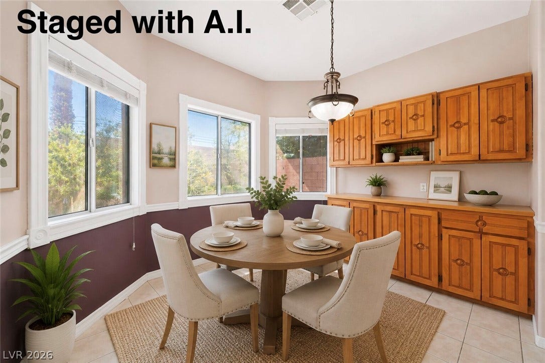 Natural light pours through multiple windows into this charming dining space with built-in cabinetry. Staged with A.I.
