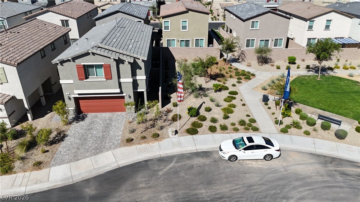 3428 Rush Avenue, Las Vegas, NV 89141 Neat desert landscaping and a paved driveway welcome you to this multi-level home.