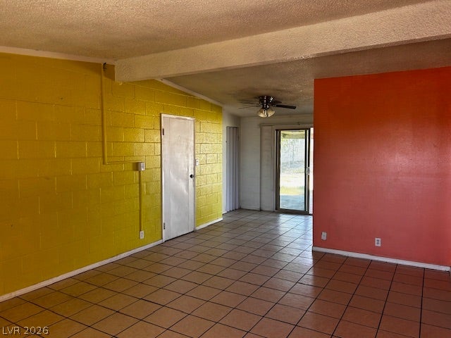 3708 Perliter Avenue, North Las Vegas, NV 89030 Durable tile flooring runs throughout this open layout featuring concrete block walls.