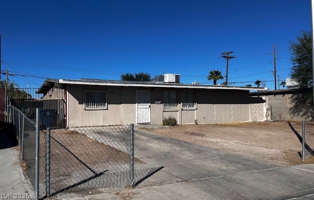 3708 Perliter Avenue, North Las Vegas, NV 89030 Single-story residential structure featuring security-barred windows and an integrated concrete driveway.