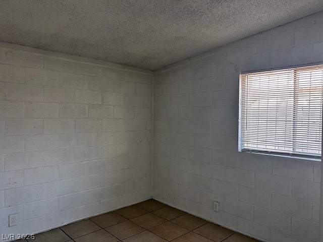 3708 Perliter Avenue, North Las Vegas, NV 89030 Exposed block walls and tiled flooring define this utilitarian space.