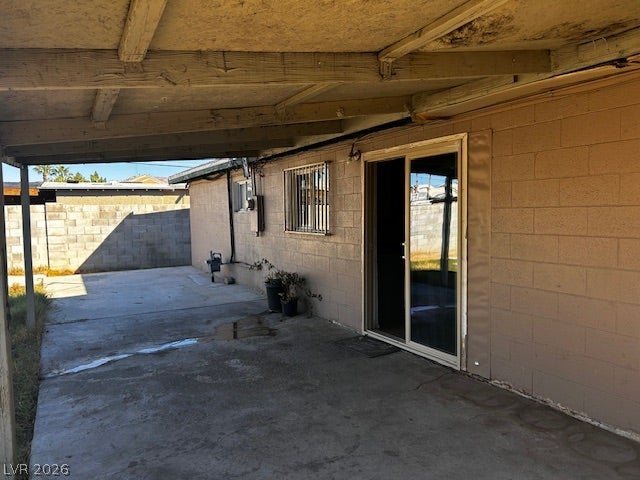 3708 Perliter Avenue, North Las Vegas, NV 89030 A covered concrete patio provides sheltered outdoor space alongside block masonry walls.