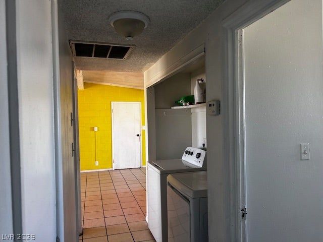 3708 Perliter Avenue, North Las Vegas, NV 89030 A functional laundry alcove opens to an adjoining room tiled in classic ceramic pavers.