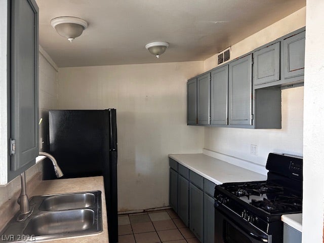 3708 Perliter Avenue, North Las Vegas, NV 89030 Functional kitchen design features classic cabinetry alongside essential cooking elements.