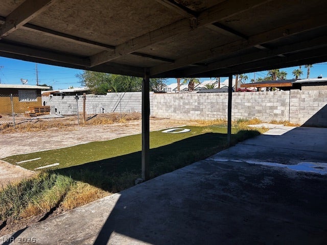 3708 Perliter Avenue, North Las Vegas, NV 89030 A spacious covered patio overlooks the fenced backyard with low-maintenance landscaping.