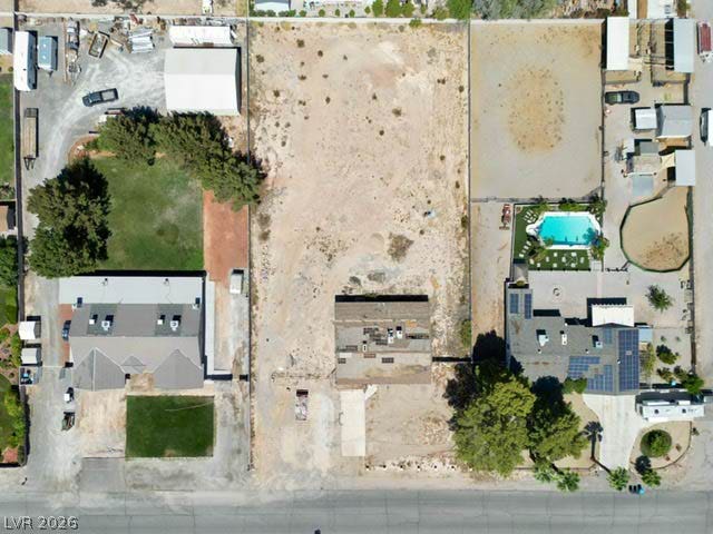 8010 W Rosada Way, Las Vegas, NV 89149 An aerial perspective showcases the spacious lot boundaries and structural footprint from above.