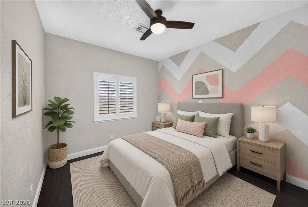 1740 Bluffs Drive, Henderson, NV 89014 This photo is virtually staged. Gleaming hardwood floors and a plantation-shuttered window define this serene bedroom retreat.