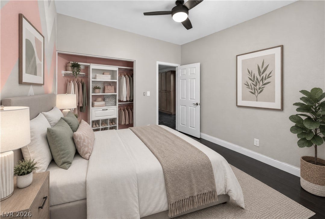 1740 Bluffs Drive, Henderson, NV 89014 This photo is virtually staged. Gleaming dark hardwood flooring complements the neat, open-concept closet system and crisp neutral walls.