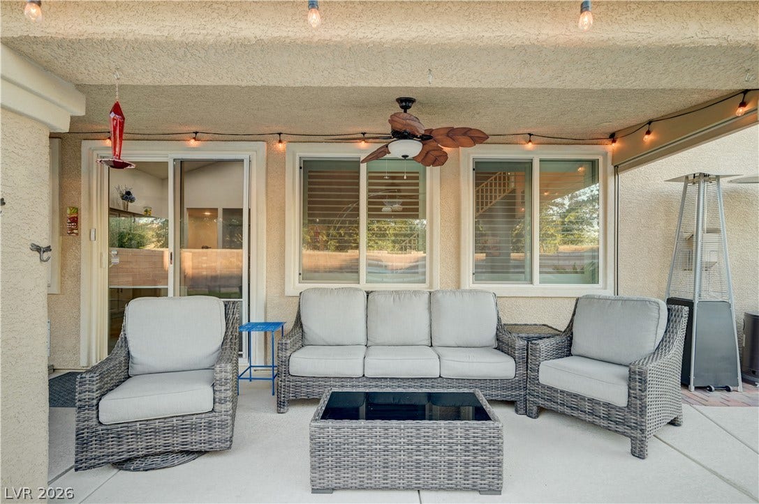 4120 Hawks Glide Avenue, North Las Vegas, NV 89084 A spacious covered patio provides concrete flooring and sliding glass door access to the interior.