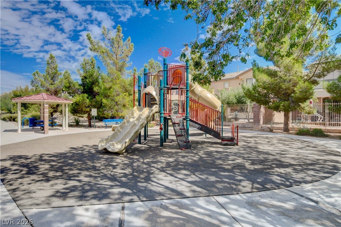 4120 Hawks Glide Avenue, North Las Vegas, NV 89084 A well-maintained neighborhood playground is situated adjacent to a shaded picnic gazebo.