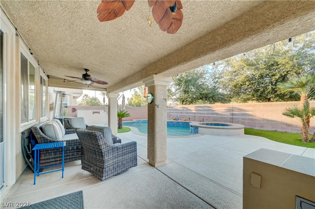 4120 Hawks Glide Avenue, North Las Vegas, NV 89084 A spacious covered patio overlooks the private backyard pool and spa.