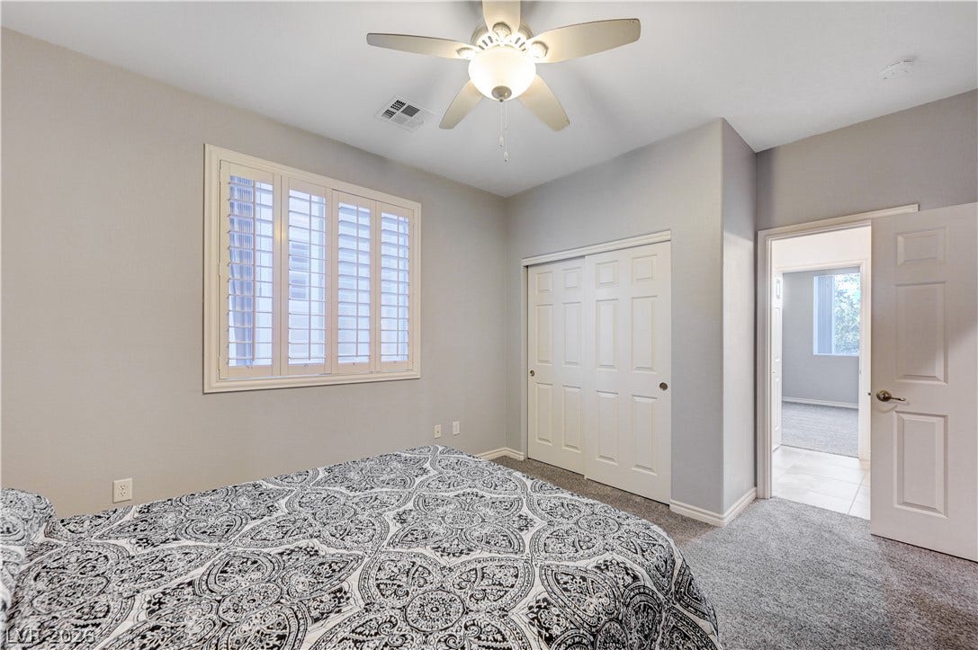 4120 Hawks Glide Avenue, North Las Vegas, NV 89084 Plush carpeting and plantation shutters highlight this inviting space.