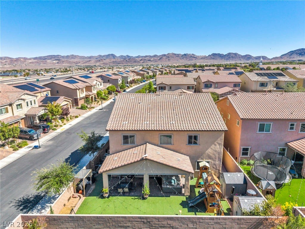 Scenic mountain vistas frame this multi-level neighborhood setting with private backyard spaces.