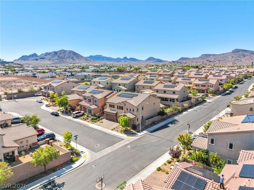 Sweeping mountain vistas frame this peaceful neighborhood of modern multi-level homes.