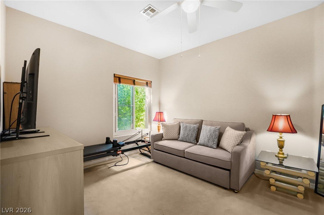 2738 Grand Forks Road, Henderson, NV 89052 Carpeted flooring and neutral walls create a comfortable and versatile bonus room layout.