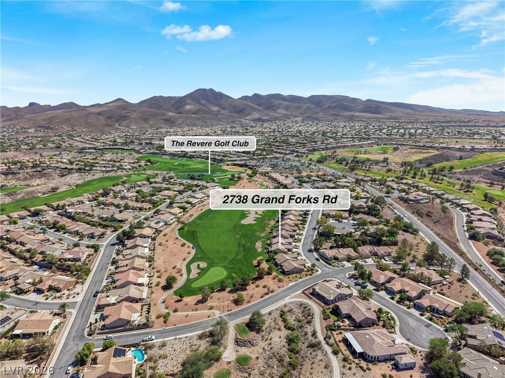 2738 Grand Forks Road, Henderson, NV 89052 Panoramic mountain and golf course views frame this master-planned neighborhood.
