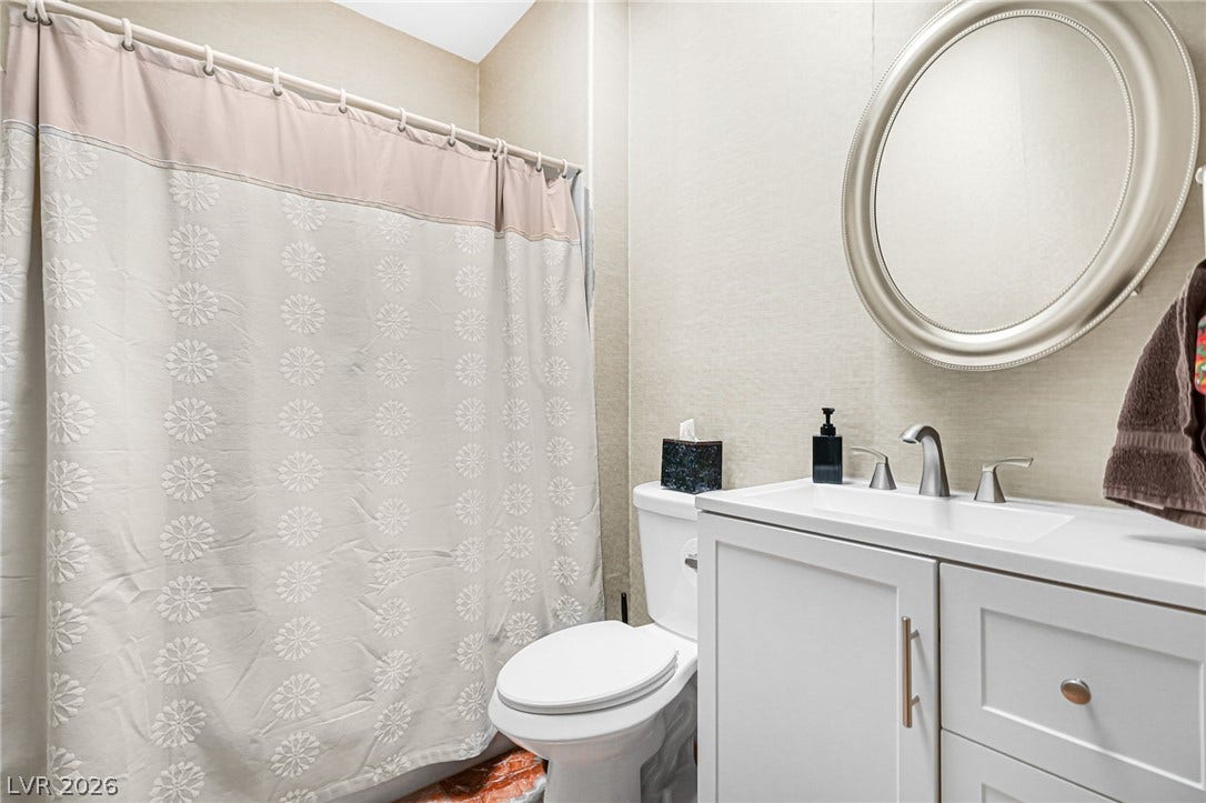 2738 Grand Forks Road, Henderson, NV 89052 Clean lines and a modern vanity define this updated full bathroom.
