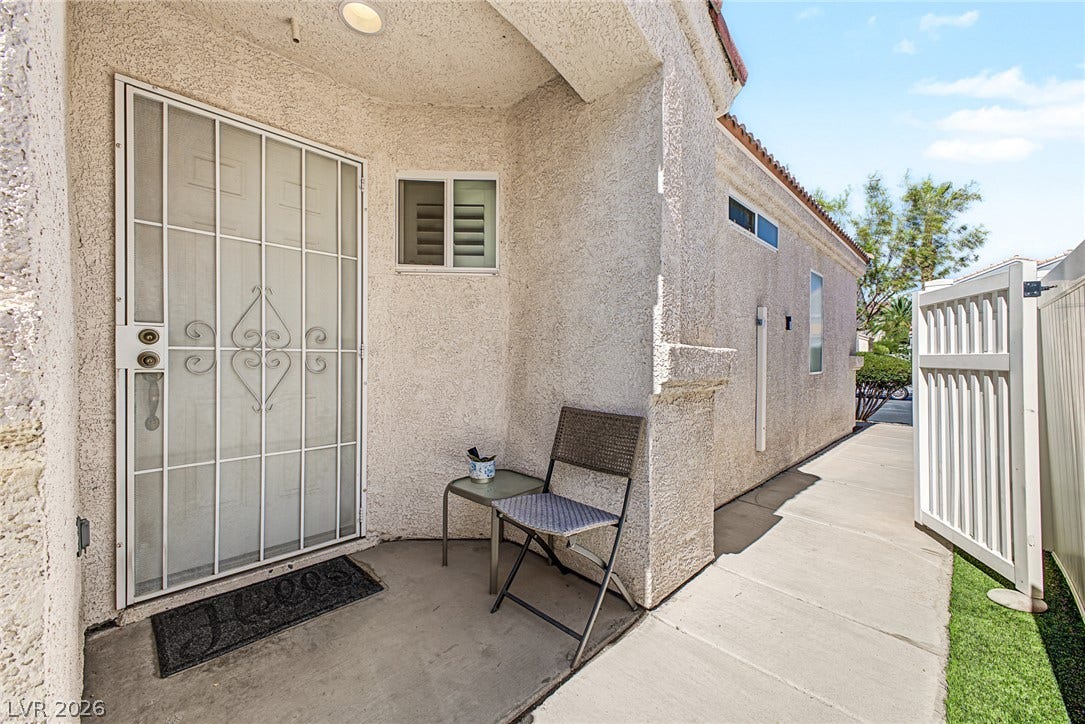 629 Lava Beds Way, North Las Vegas, NV 89084 A stucco exterior and concrete pathway lead to the secure front entry.
